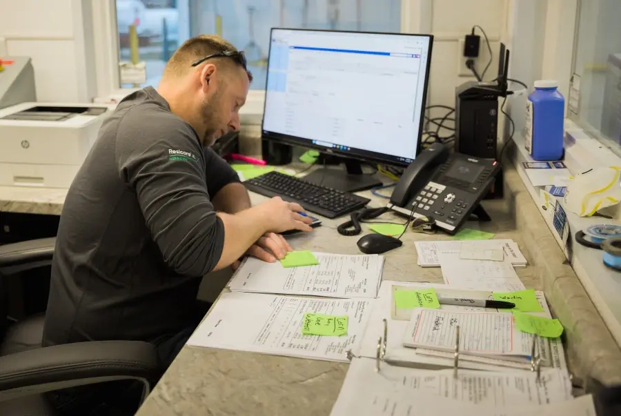 Retailer working in office